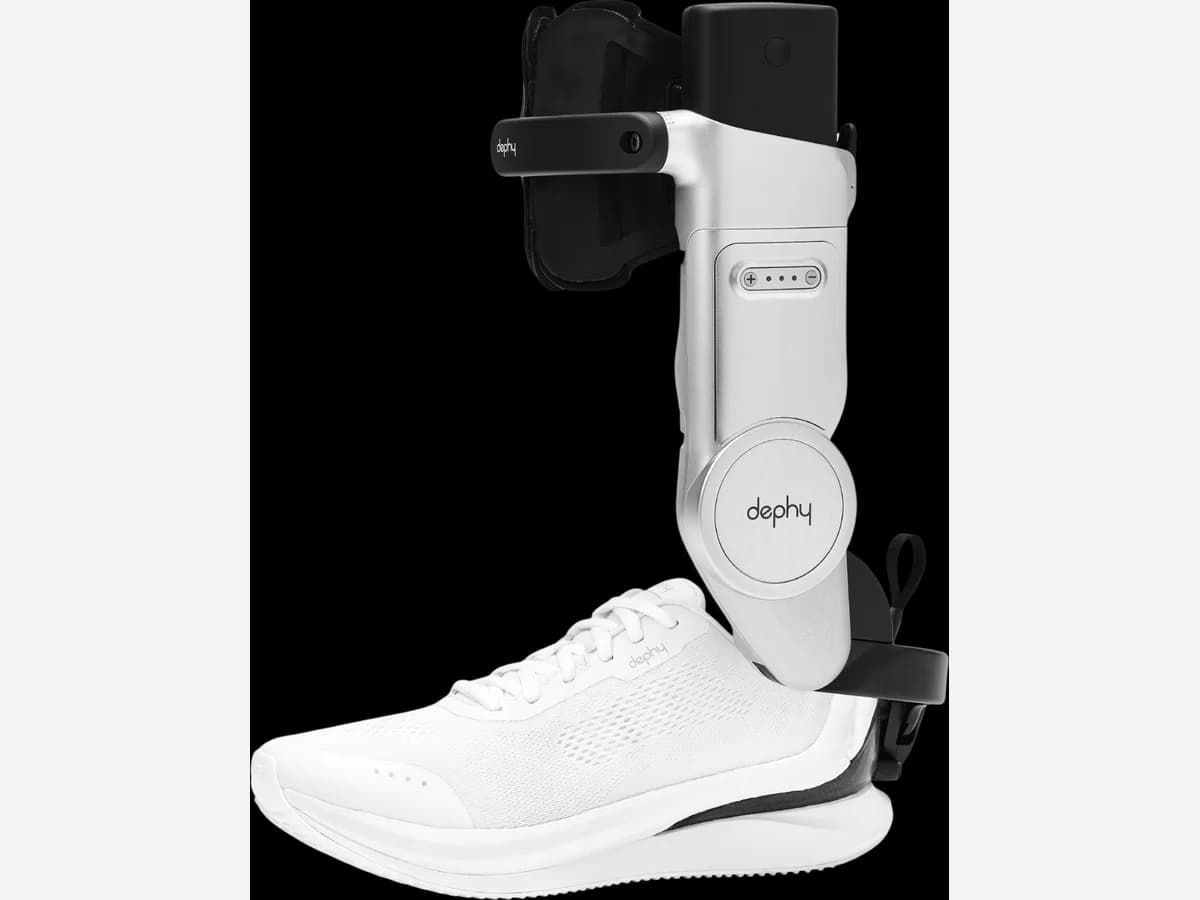 Dephy Sidekick attached to a white shoe, showing the ankle unit and shin strap.